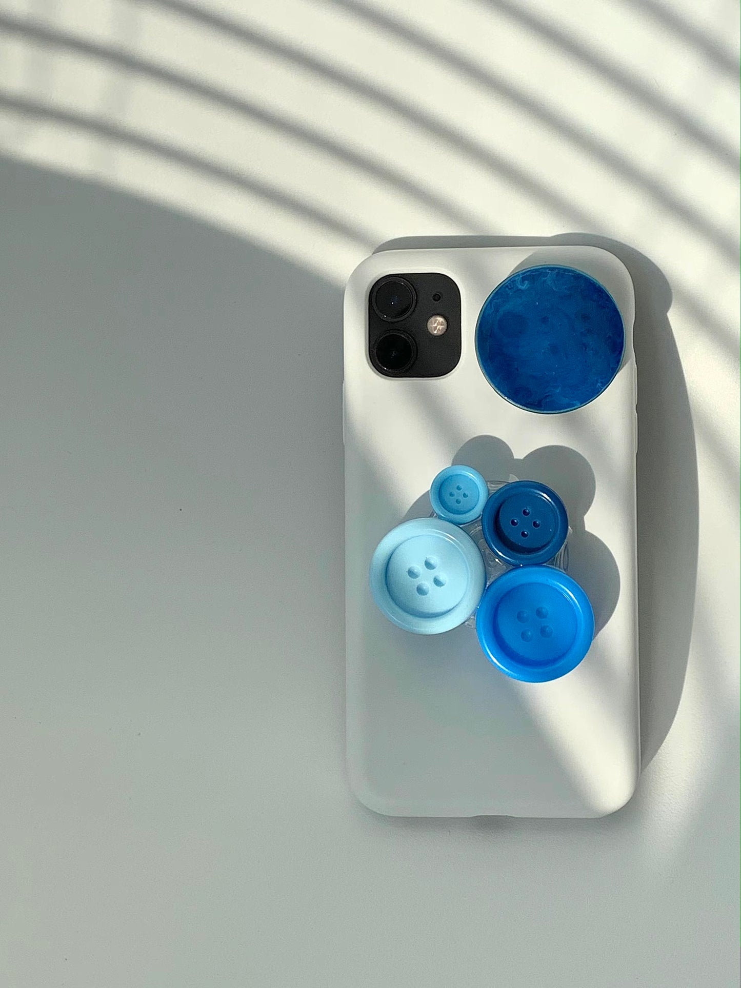 Button phone holder made by Grandma